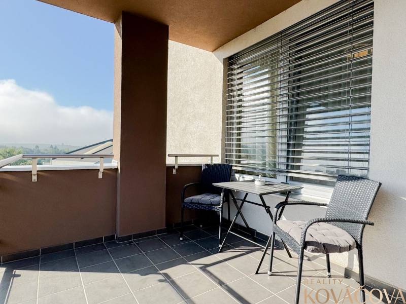 Balcony on Saratovska Street in Trenčín with a view; 3-room apartment, outdoor seating.