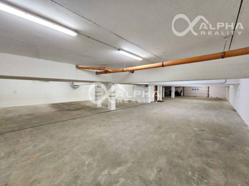 Parking spaces in an underground garage for a 2-room apartment.