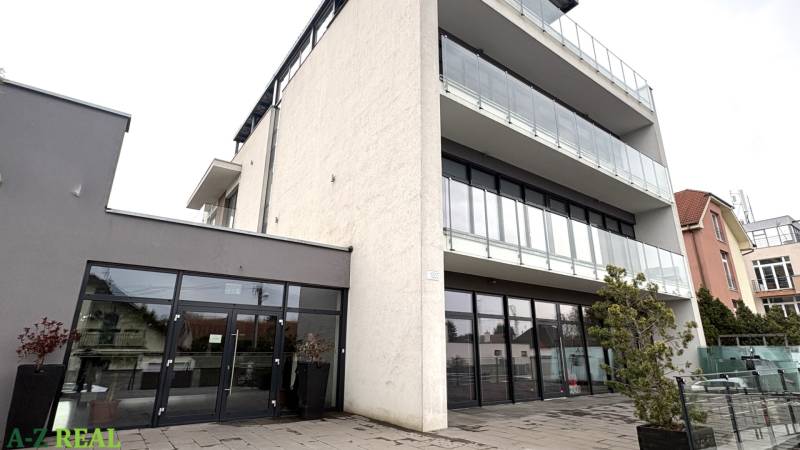 Building with glass balconies on Nové záhrady street in Bratislava - Ružinov, offices.
