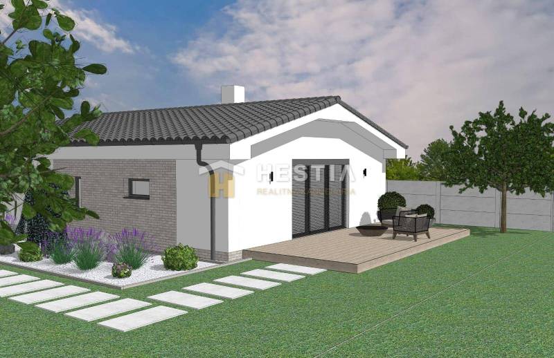 A family house in Sekule with a terrace surrounded by greenery and a garden.