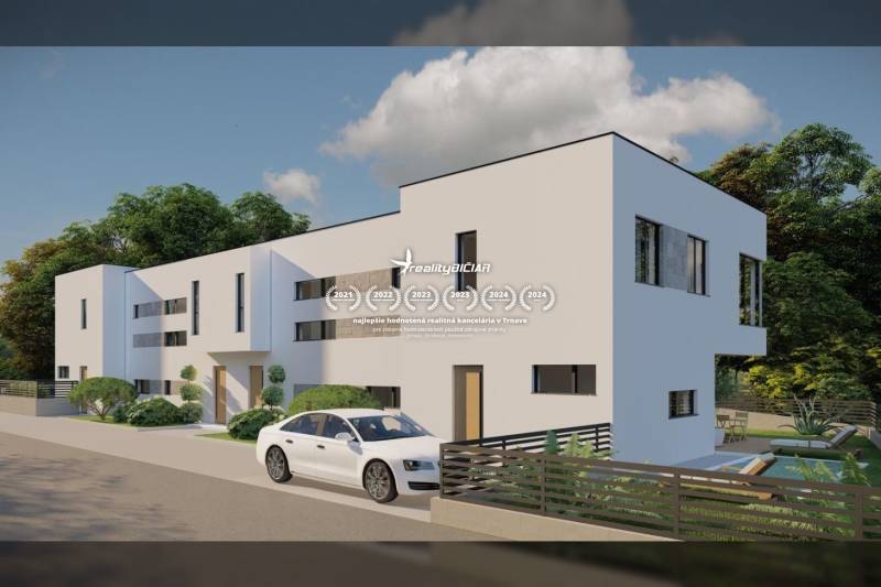 A family house in the city of Nin on Nin Street with a white facade and a modern car in front of it.