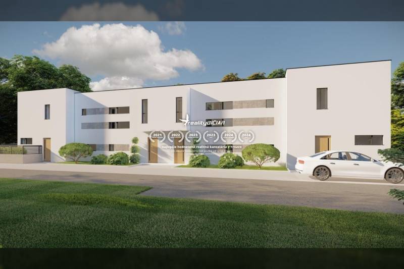 A family house in the town of Nin on Nin Street with a modern white facade and greenery.