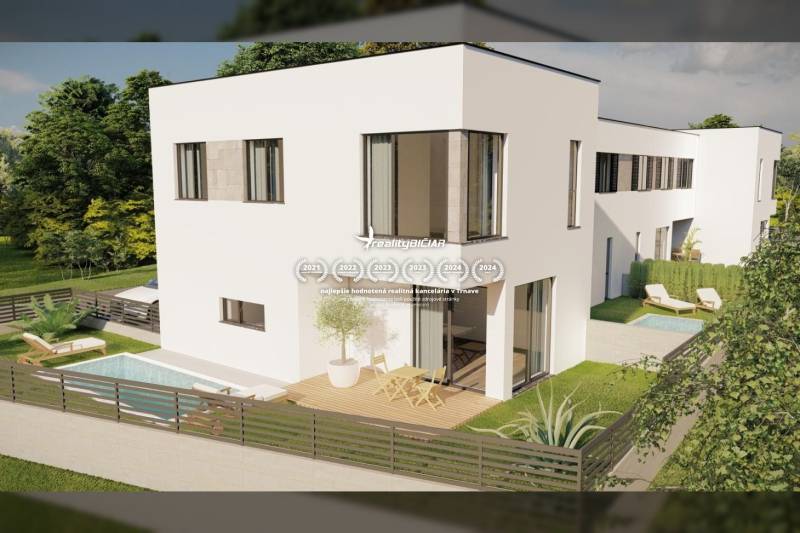 A family house in the town of Nin with a garden, swimming pool, and terrace, surrounded by greenery.