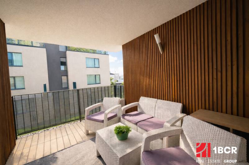 Balcony in a 3-room apartment on Na piesku street, Bratislava - Ružinov, with modern seating.