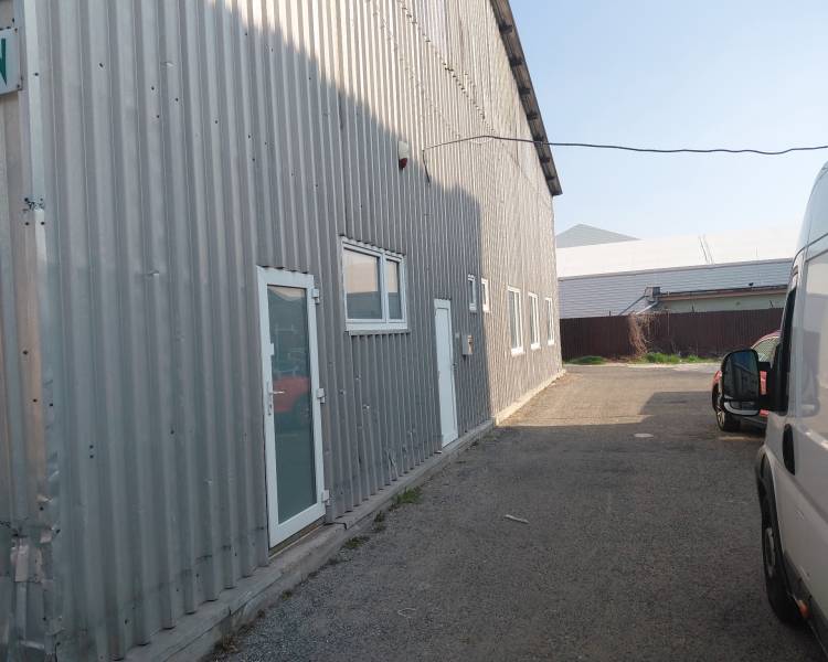 Warehouses and halls in Bratislava - Nové Mesto with a sheet metal facade and parking lot.