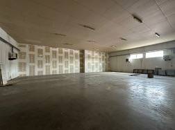 Production facilities with high ceilings and concrete floors.