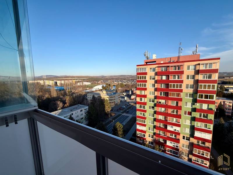 View from the studio apartment on Štefánikova Street in Senica with a colorful apartment building.