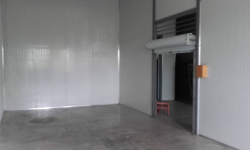 Warehouses and halls with concrete floors and sliding doors.