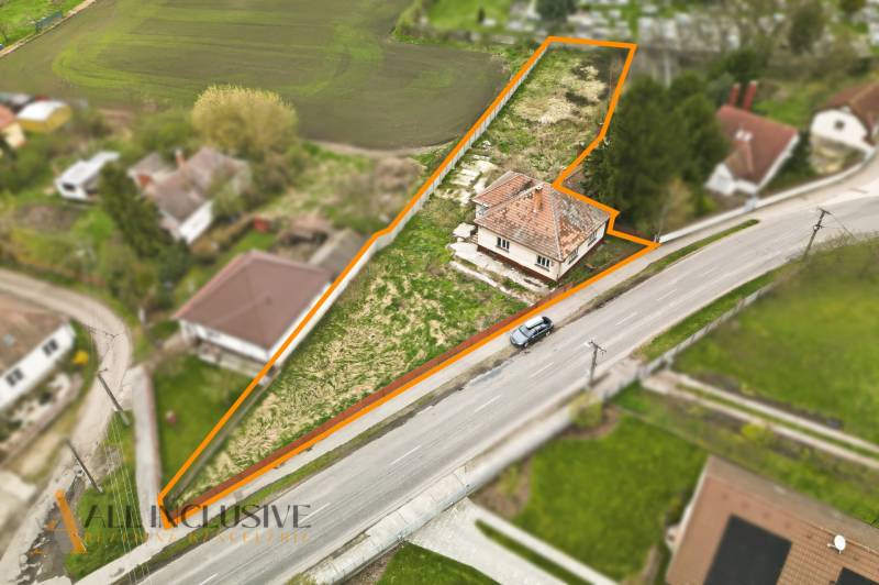 Aerial view of a family house in Michal na Ostrove with a large plot of land.