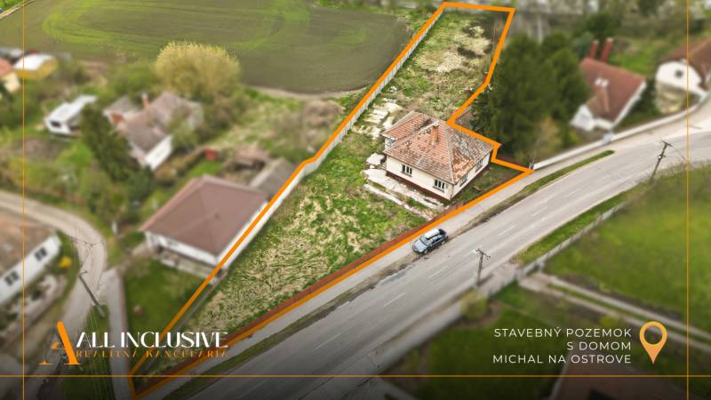 Aerial view of a construction site and a family house in Michal na Ostrove.