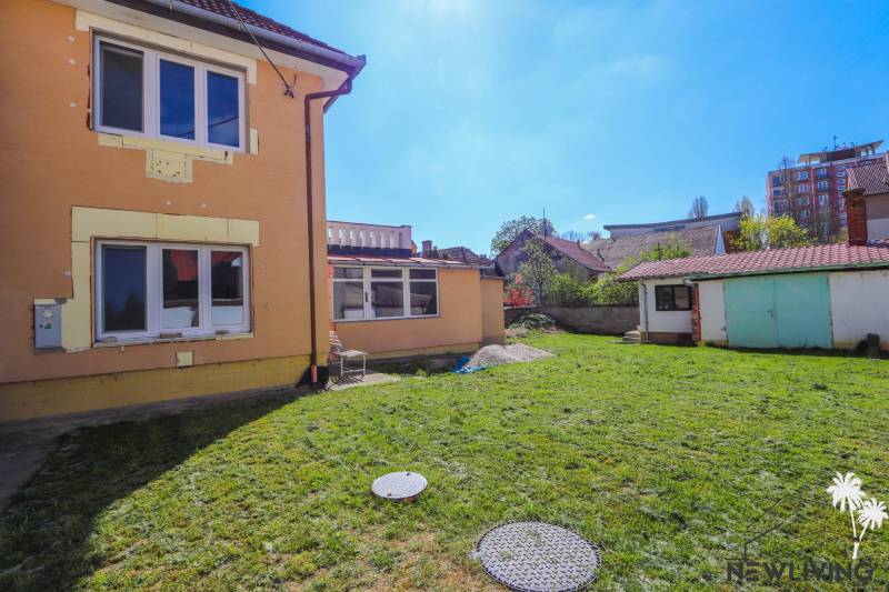 A family house on Hviezdoslavova Street in Piešťany with an adjacent yard and garage.