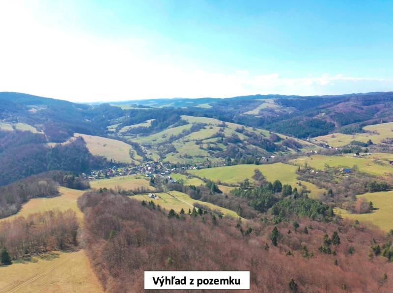 Hills and valleys in the distance of agricultural and forest lands in Lysá pod Makytou.