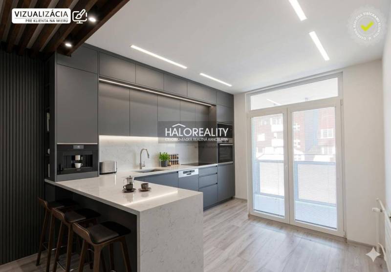 A kitchen in a 3-room apartment with a wooden decor floor and large windows.