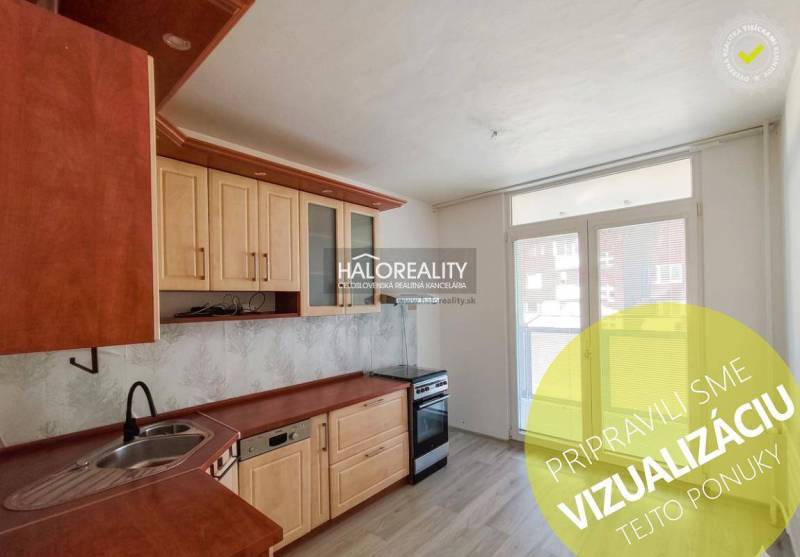 A kitchen with wooden decor and a kitchen unit in a 3-room apartment.