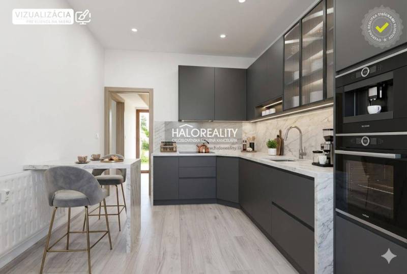 A kitchen with marble elements and dark cabinets in a three-room apartment, with a floor featuring a wooden decor.
