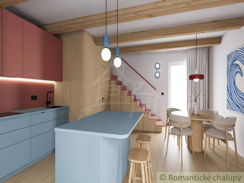 A cabin with a wooden floor decor includes a kitchen, dining area, and stairs.