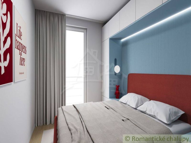 Bedroom in a cabin with light walls, a red headboard, and a quote on the wall.