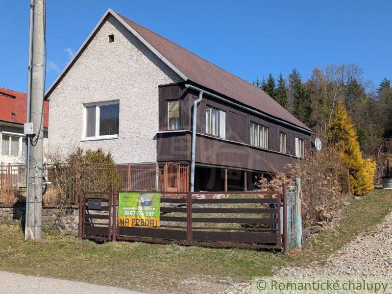 Family house in Kalinovo with wooden elements and a garden, for sale.