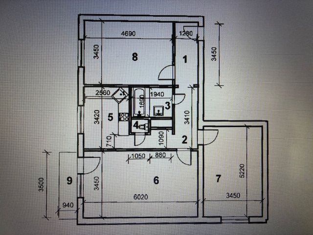 Floor plan of a 3-room apartment with rooms and dimensions on each side.