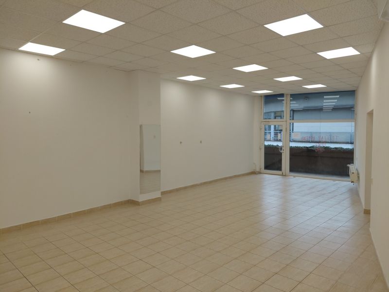 Bright commercial spaces with tiles and large windows.