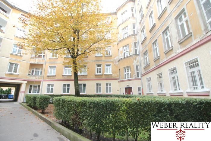 The courtyard of a residential building with colorful leaves on Medená Street, Bratislava - Old Town.