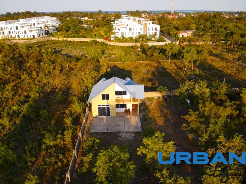 A house surrounded by greenery on a plot - commercial in the area of Paje, Unguja South.