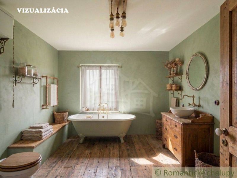 A bathroom in a family house with a wooden decor floor and a freestanding bathtub.