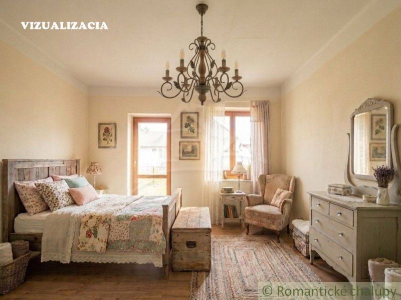 Rustic bedroom with wooden furniture and wood-decorated flooring in a family house.