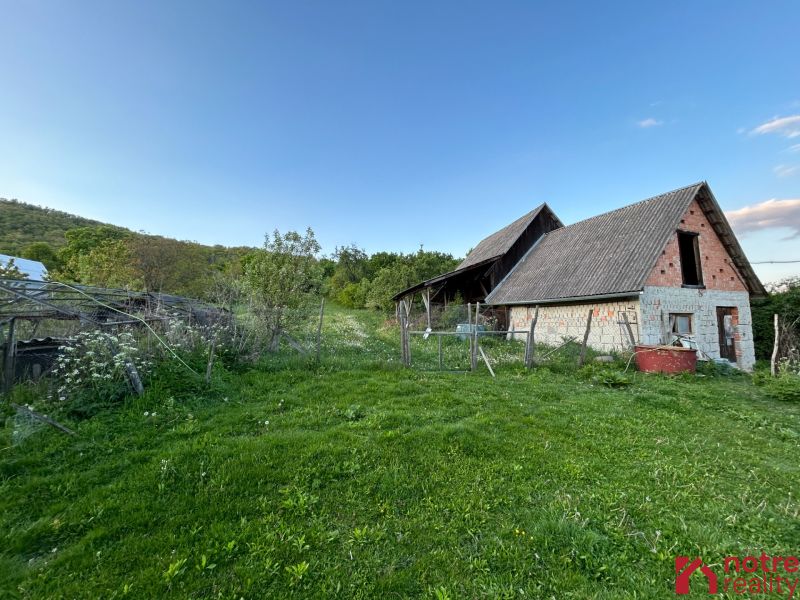 A family house in Kosihovce surrounded by greenery and rural landscape.