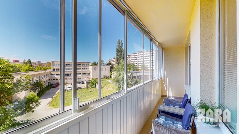 Glazed balcony with a view of Clementisova Street, Košice - Dargovských hrdinov district.
