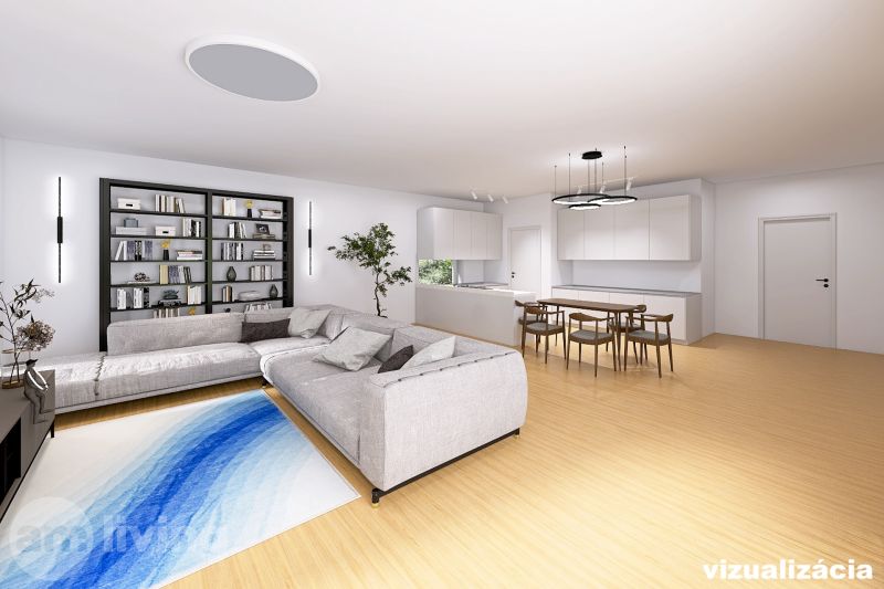 Living room in a family house with a spacious sofa, a bookshelf, and a floor with a wood decor.