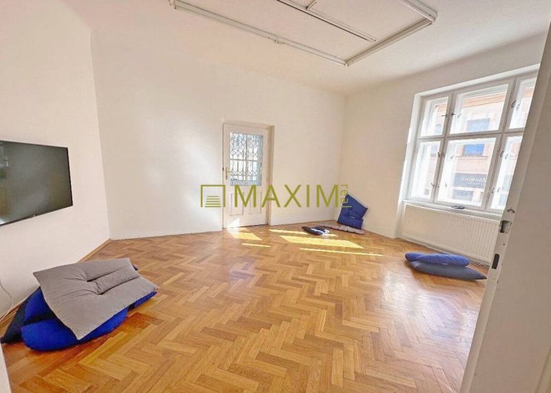 An empty room with a wooden floor decor in a 3-room apartment.