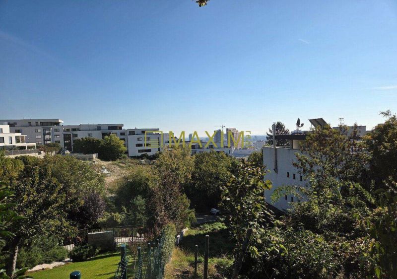 View of buildings surrounded by greenery, location Bratislava - Nové Mesto, Tupého, plots - residential.