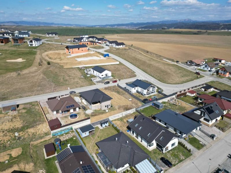 An aerial view of residential plots in Malý Slavkov surrounded by nature.