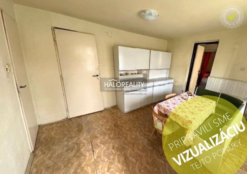 Interior of a family house with a dining table and cabinets, floor with wood decor.