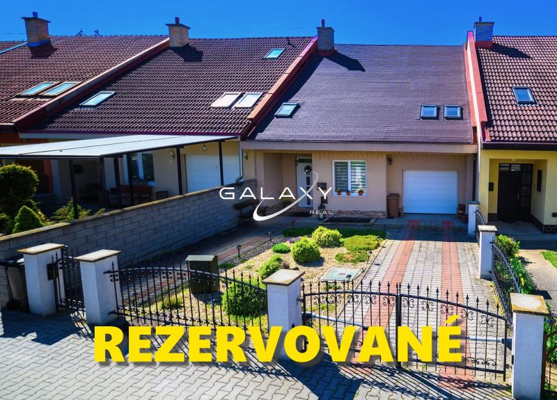 A family house in Rimavská Sobota with a garden, gate, and parking space.