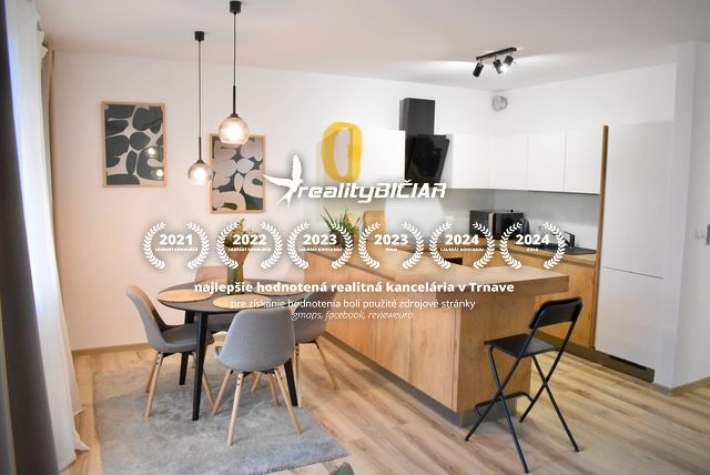 A kitchen with a dining area and a wooden decor floor in a 2-room apartment.