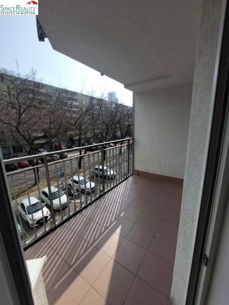 The balcony of a 2-room apartment in Bratislava - Ružinov on Jégého Street with a view of the street.