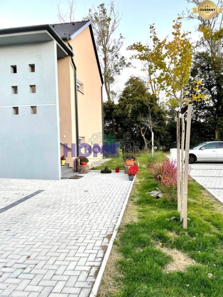 Exterior of a 3-room apartment on Nyárfa Street in Rajka with a paved access.