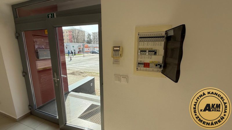 Entrance doors of commercial premises overlooking J. Šverma Street in the city of Zvolen.