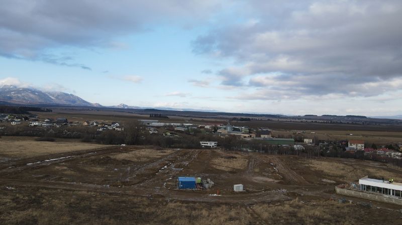View of Development Plots in Mlynica with Surroundings and Mountains in the Background.