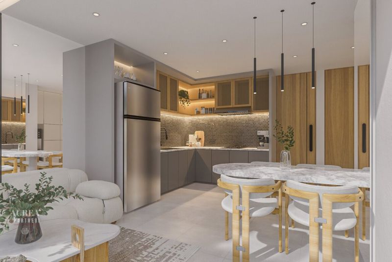 A kitchen in a villa with illuminated shelves, a marble table, and comfortable seating.