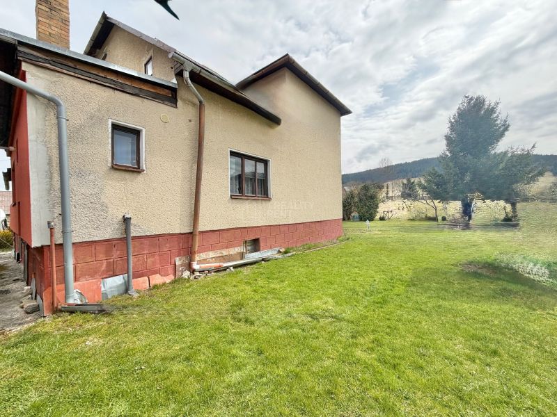 A family house in Vysoká nad Kysucou with a lawn on Vysoká nad Kysucou street.