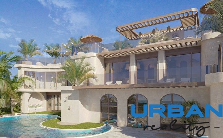 Luxury villa in Nungwi with a pool and terrace surrounded by palm trees.