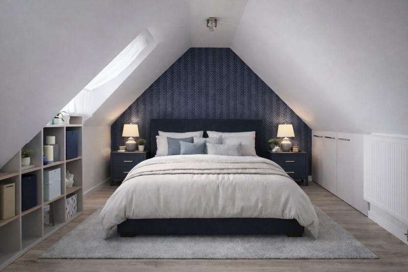 A slanted roof bedroom in a 2-room apartment with a wooden decor floor and a decorative wall.