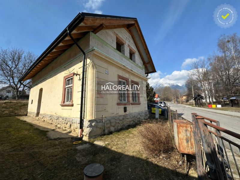 A family house in Nová Lesná with a visible facade and surroundings in a quiet street.