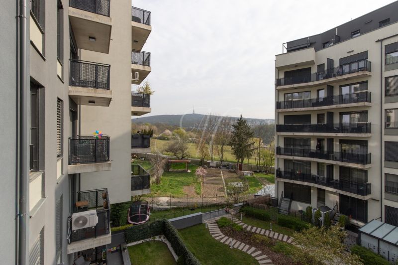 Apartment buildings with balconies and an outdoor courtyard on Rudolfa Mocka Street in Bratislava - Petržalka.