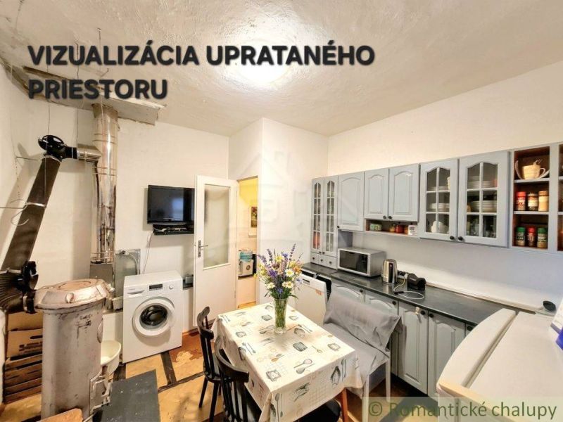 A kitchen in a family house with full equipment, including a stove and a washing machine.