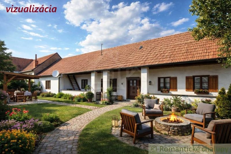 Rustic cottage in Šahy with an inner courtyard, garden, and seating area by the fire pit.