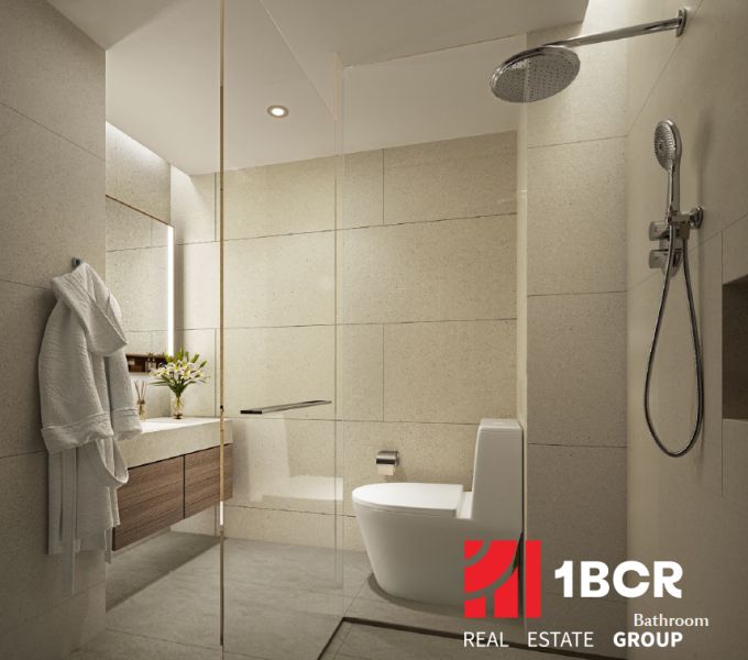 Bathroom in a 2-room apartment, simple design with a shower and toilet.